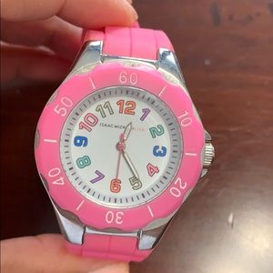 Issac Mizrahi Stainless steel back watch.